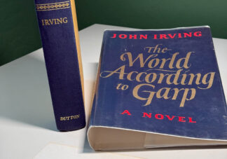 Pictures of the John Irving book The World According to Garp (1978) First Edition with Signed Notecard